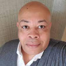 a person with a bald head