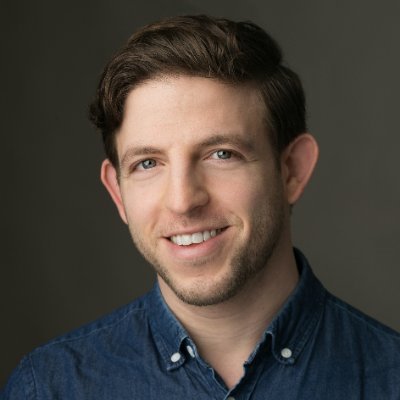 a man smiling for the camera