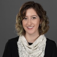 a person smiling for the camera