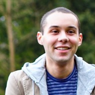 a person smiling for the camera