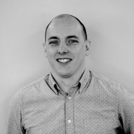 a man smiling for the camera
