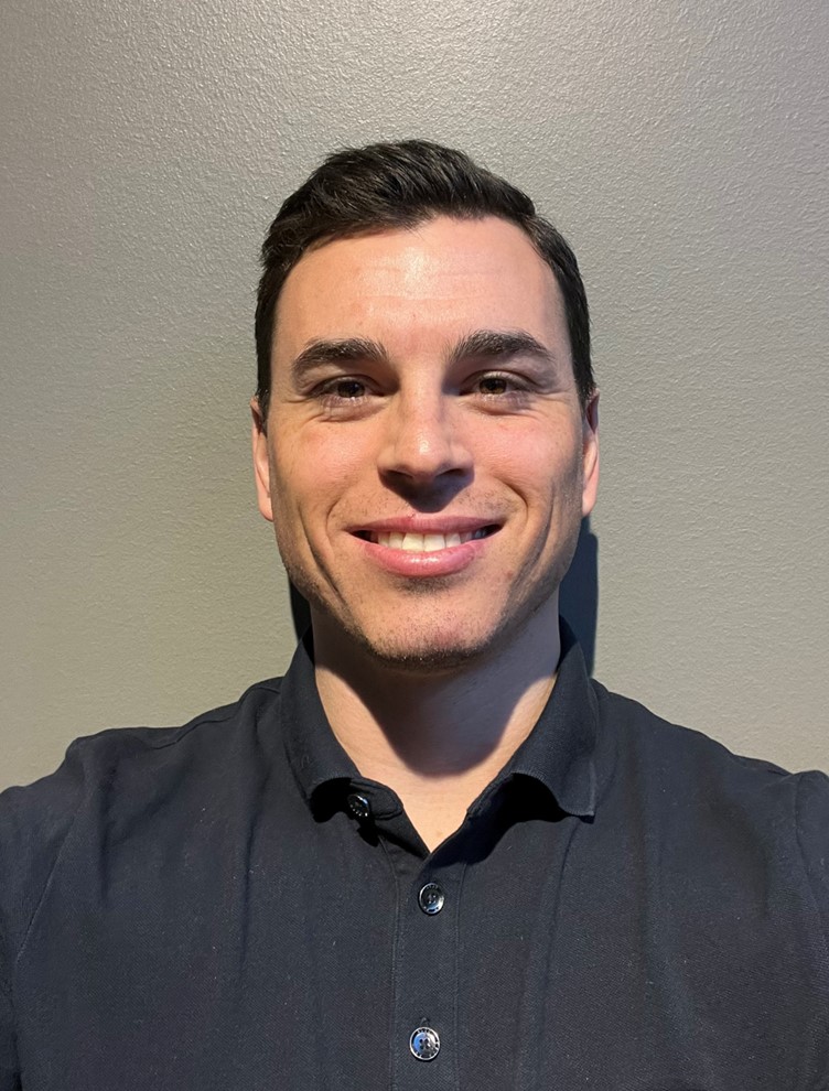 a man smiling for the camera