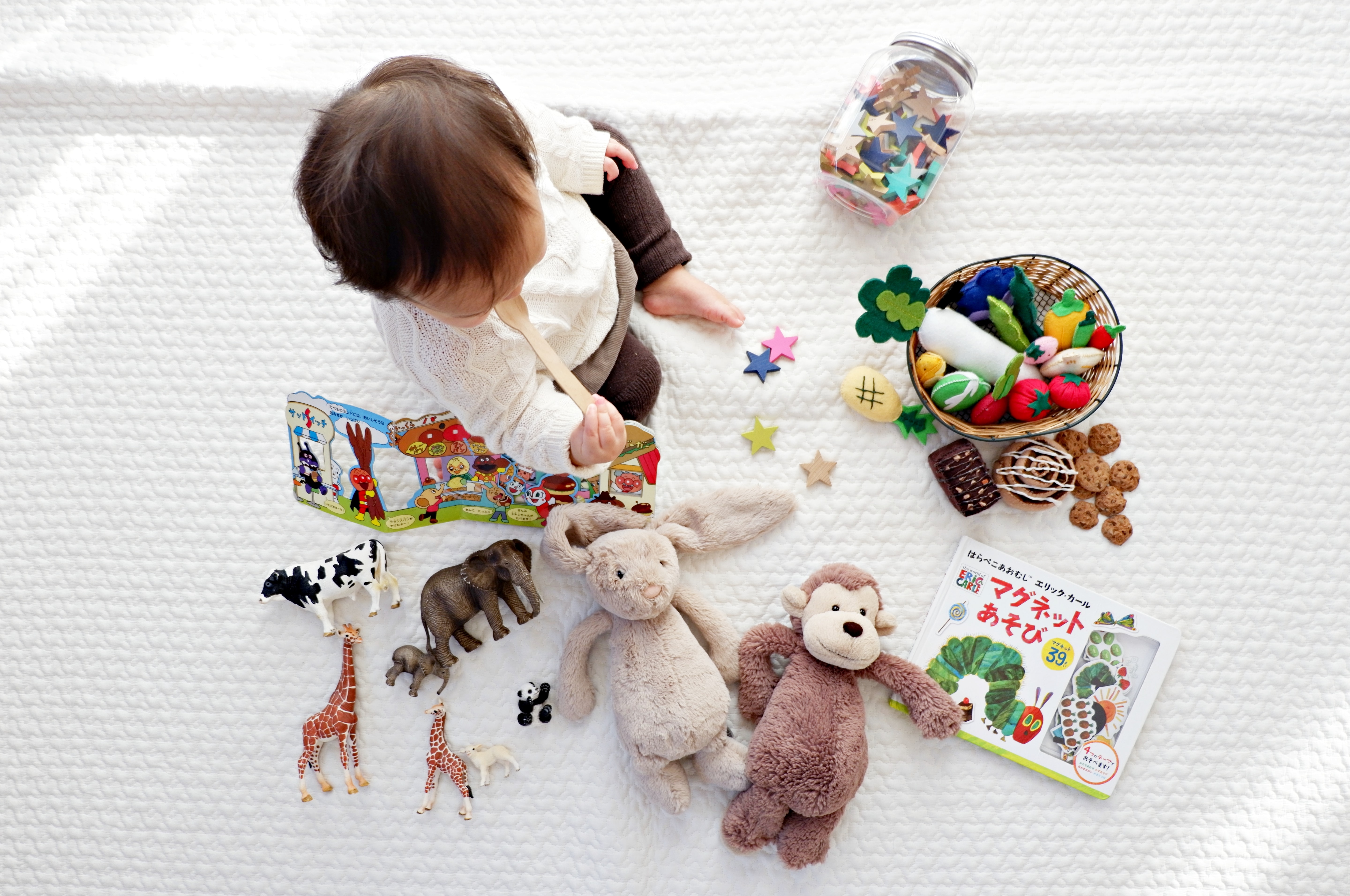 a baby playing with toys