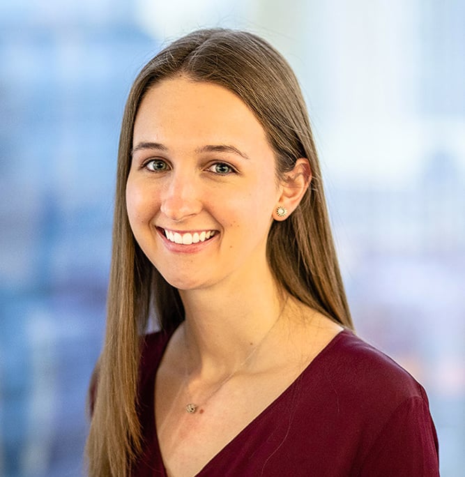 a woman smiling at the camera