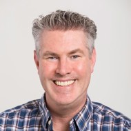 a man smiling for the camera