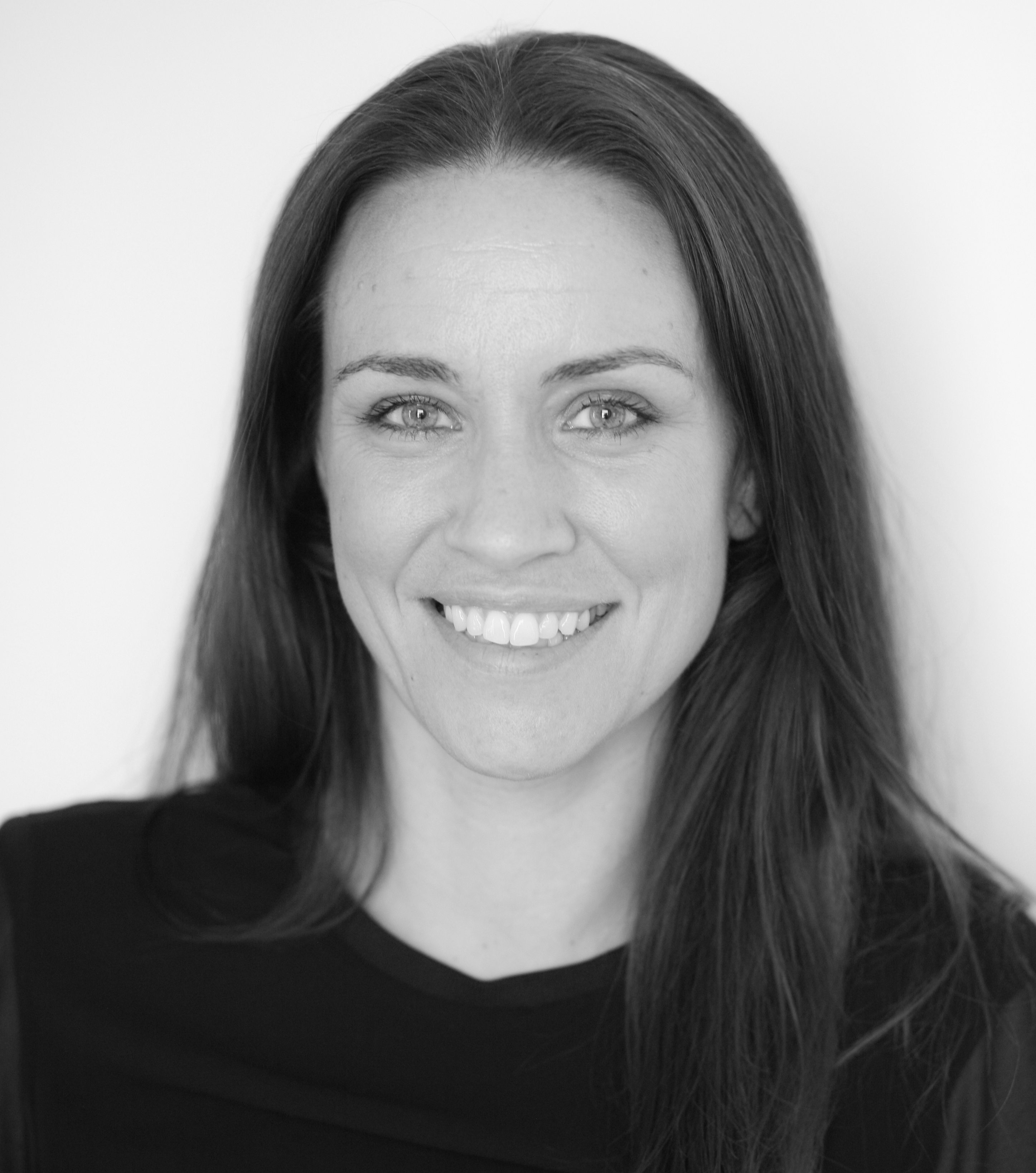 a woman smiling for the camera