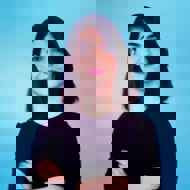 a woman with her arms crossed