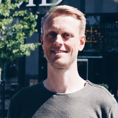 a man smiling for the camera