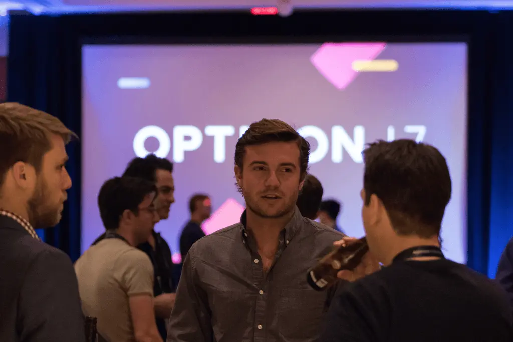 Attendees talking at Opticon17