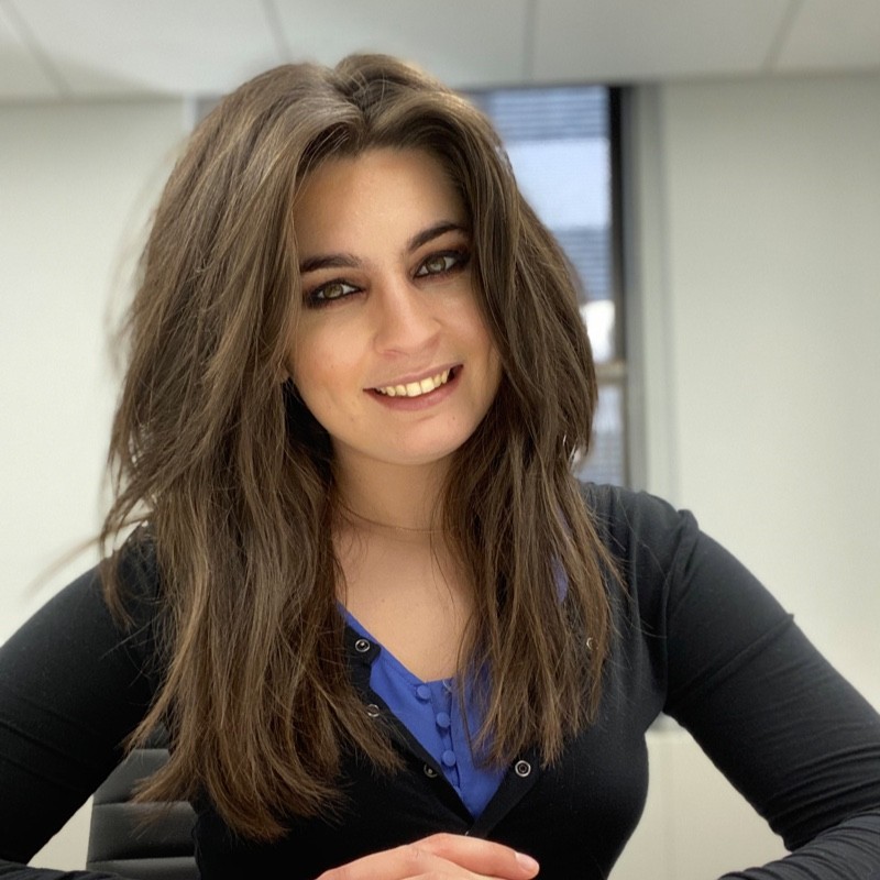 a woman smiling at the camera