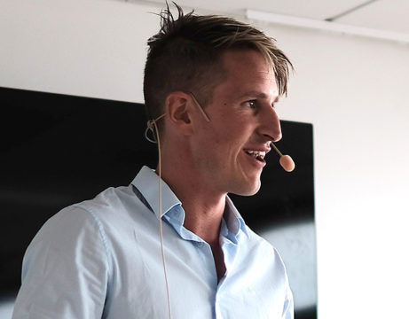 a man wearing a white shirt