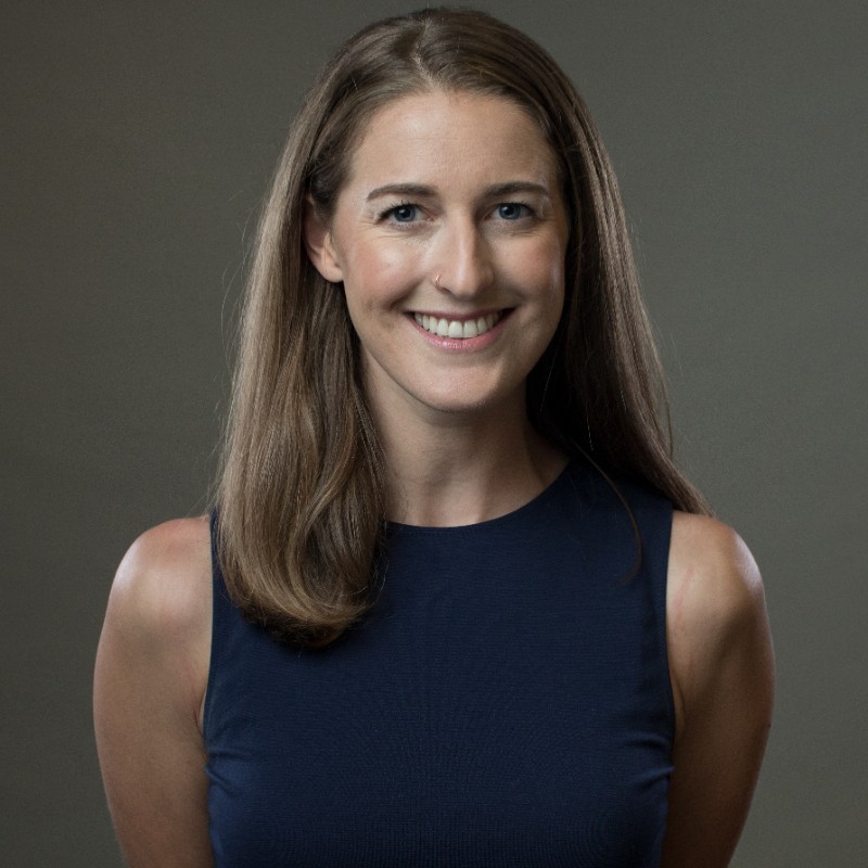 a woman smiling for the camera