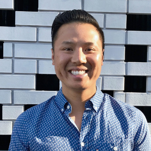 a man smiling for the camera