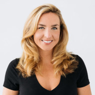 a woman smiling for the camera