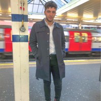 a man standing in a train station