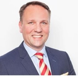 a man in a suit and tie