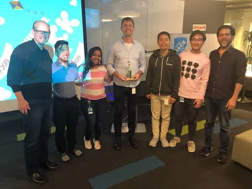 Hack Week Team with judges Jay Larson (CEO) and Bill Press (SVP Engineering)