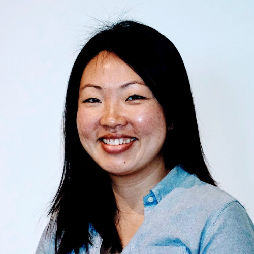a close-up of a woman smiling
