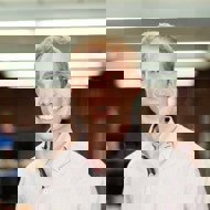 a person smiling for the camera