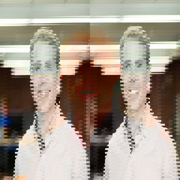 a person smiling for the camera