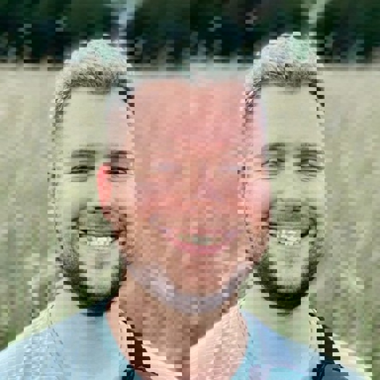 a man smiling for the camera