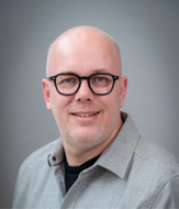 a man wearing glasses