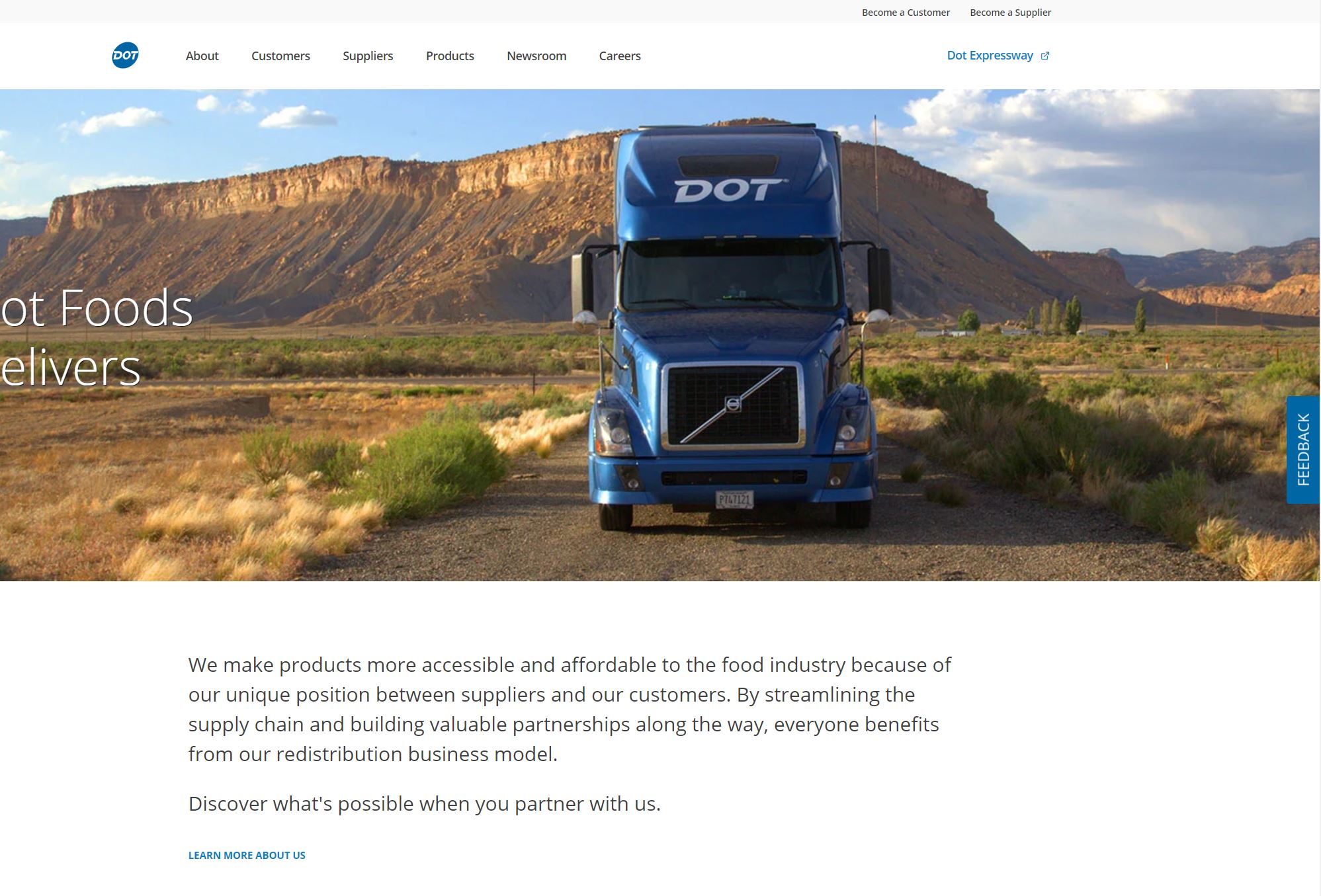 a blue truck on a dirt road