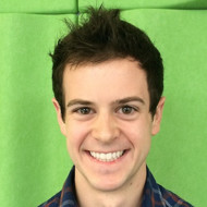 a man smiling for the camera