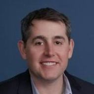 a man smiling for the camera
