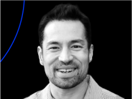 a man smiling for the camera