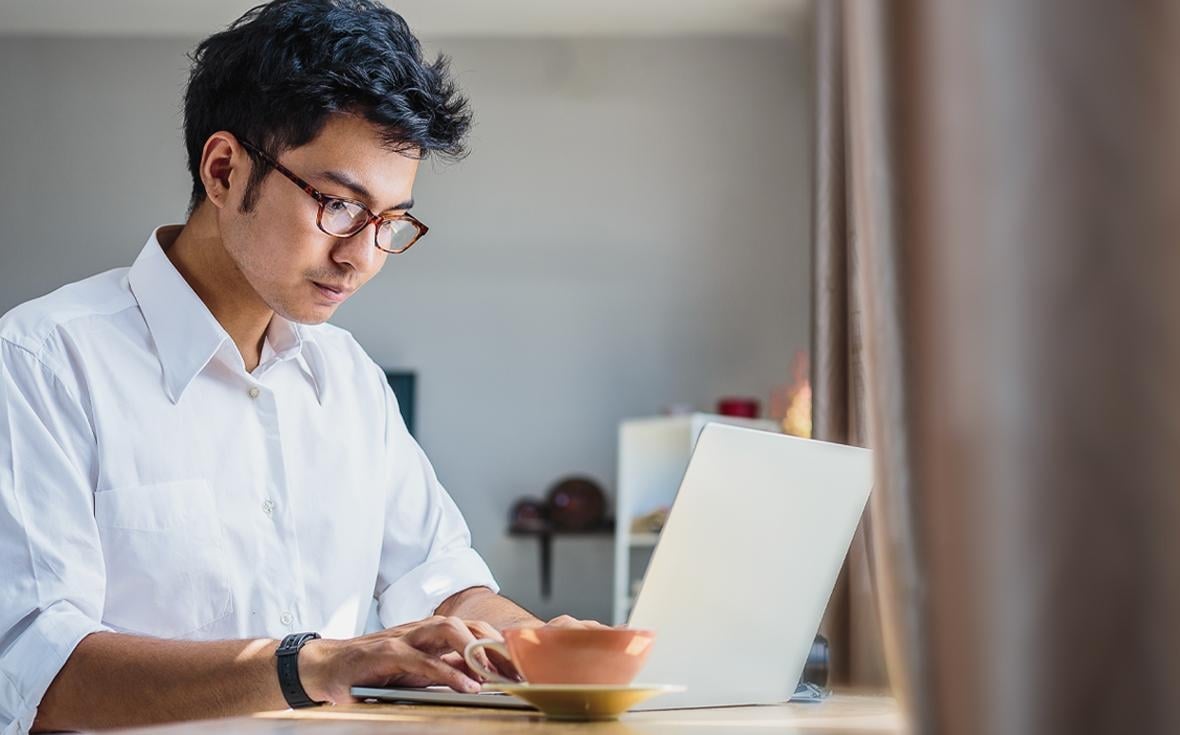 a man using a laptop