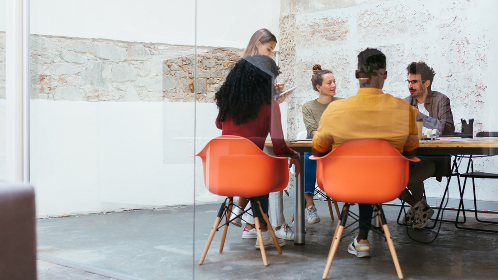 a group of people sitting at a table