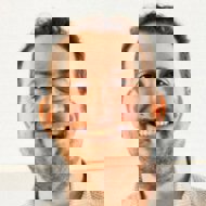 a man smiling for the camera