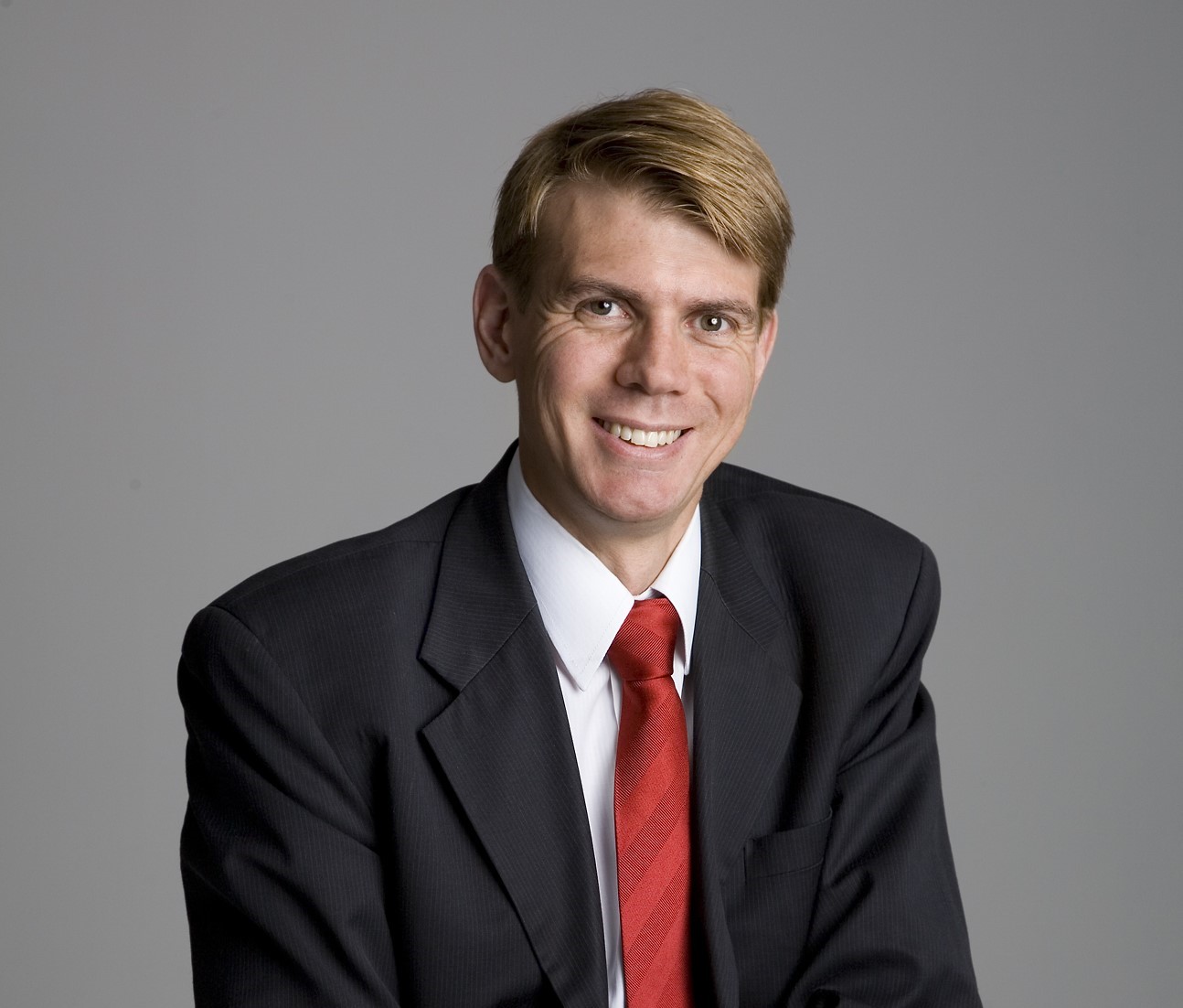a man in a suit and tie