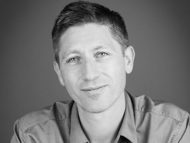 a man smiling for the camera