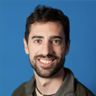 a man smiling for the camera