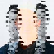 a man smiling for the camera