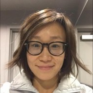 a woman wearing glasses